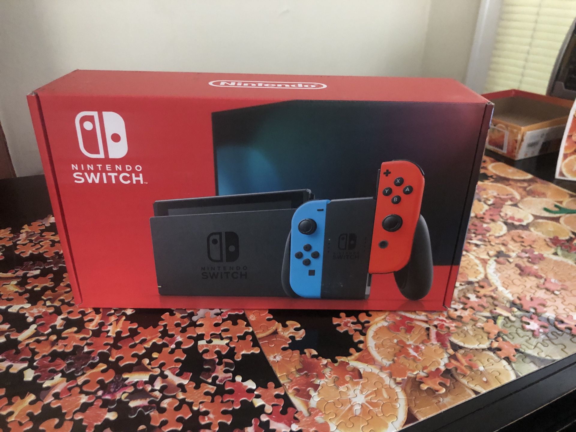 Brand new Nintendo Switch V2 32GB w/ red and blue joy-cons