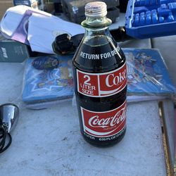 70s 2 litter coke (sealed)