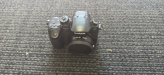Panasonic Lumix GH4 Camera + Sigma Lens + 3 Batteries