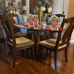 Dining table with four chairs.