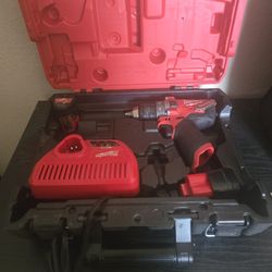 Milwaukee Fuel  Used 12v Hammer Drill With 2 Batteries 