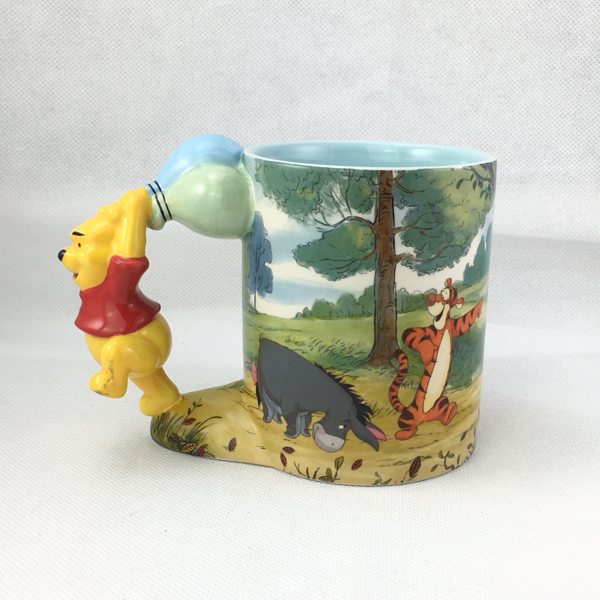 Disney Winnie the Pooh collectible mug small crazing fracture in foot but not broken
