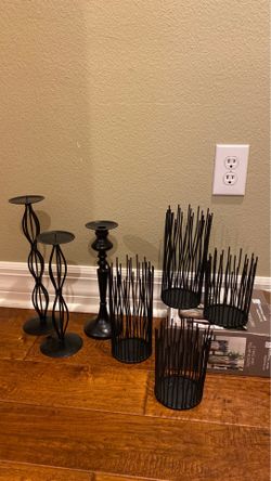 Seven Black candle holders.  Perfect for the upcoming fall decor. All metal.