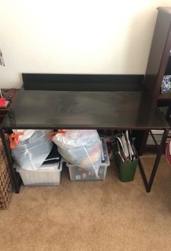 Brown glass top desk with metal frame
