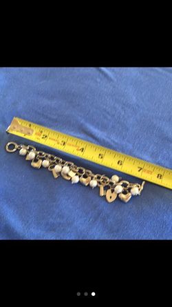 Charm bracelet with freshwater pearls. Tarnish free