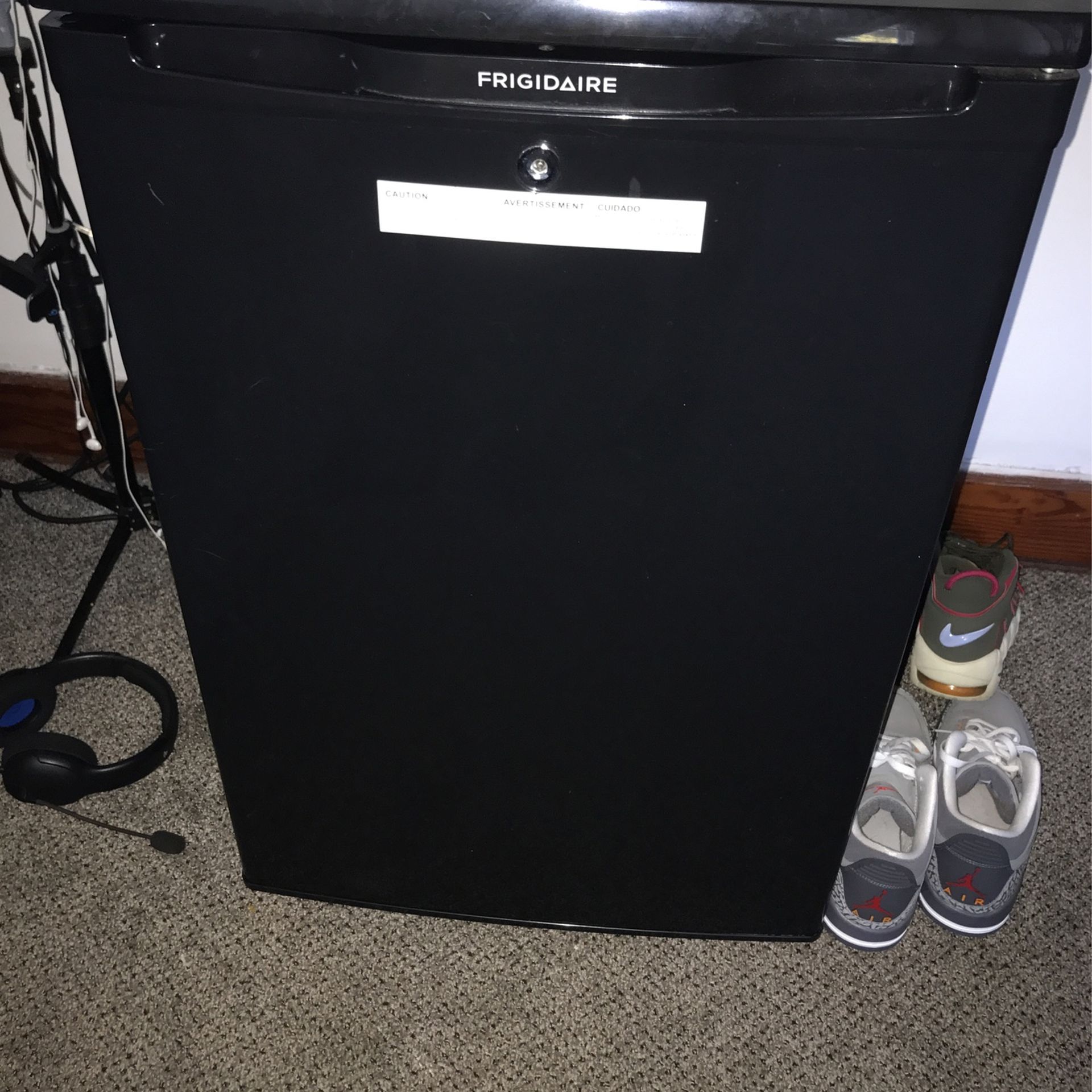 Frigidaire mini refrigerator, nothing wrong with it works perfectly fine! will be cleaned out for whoever buys it! needs gone ASAP!