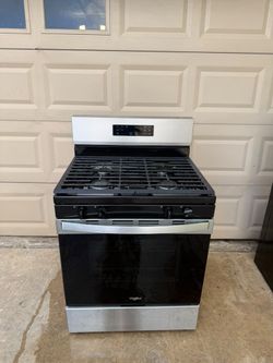 Whirlpool gas stove like new. Free delivery and installation