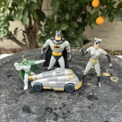 Vintage 1990s DC Comics Batman–themed Happy Meal toy lot, featuring four classic characters and vehicles inspired by early Batman movies and animated-