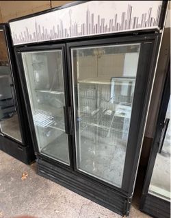 True glass door freezer 54”