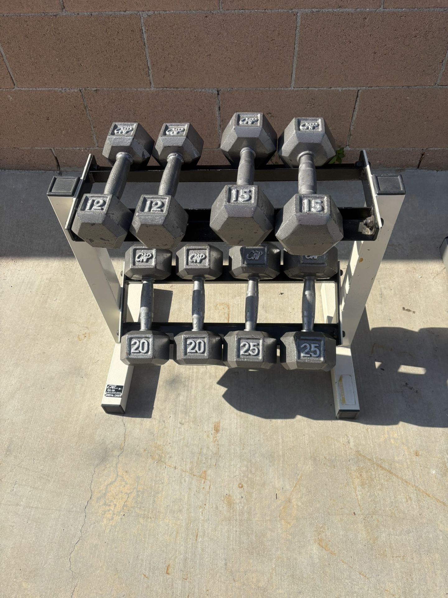 Small dumbbells rack with dumbbells  12-15-20& 25 pounds