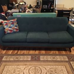 ROOMS TO GO EAST SIDE SOFA MID CENTURY MODERN-Tight Tufted Back Teal Color Sofa