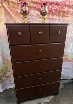 Oversized wooden dresser with five extra large drawers has been refurbished colors brown and antique gold!🌺
