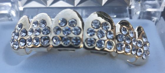 Custom Diamond Grills $65 obo. Mold to fit instantly....