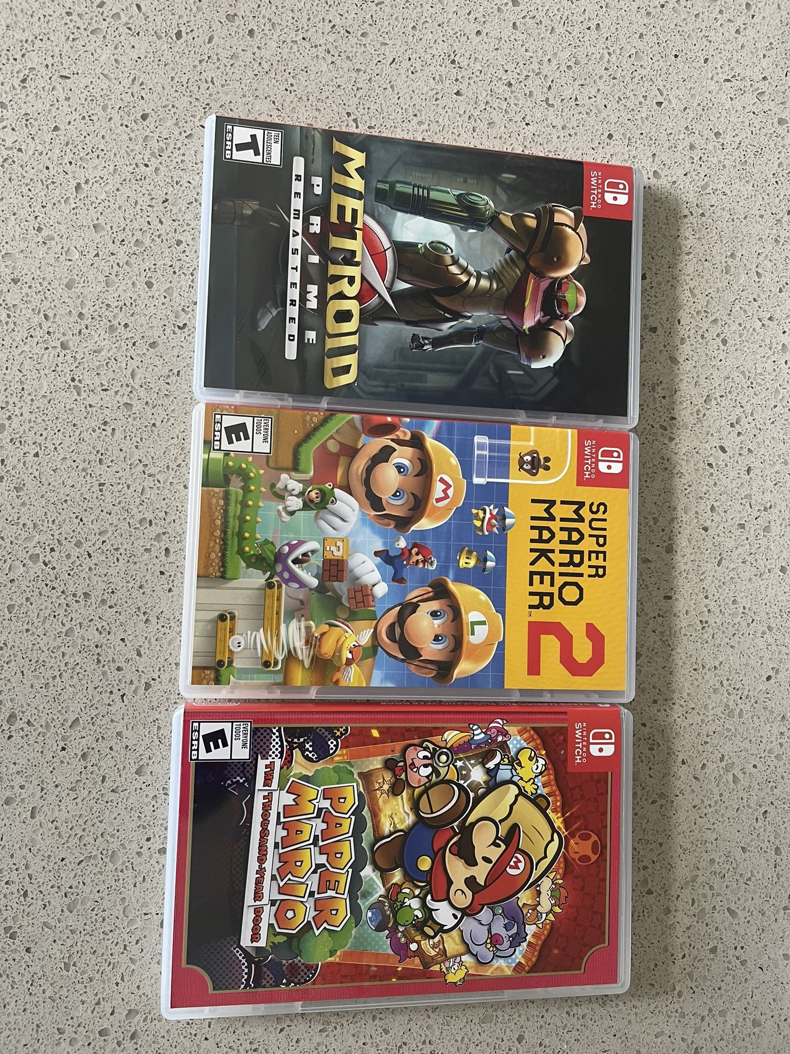 Nintendo Switch Games-Paper Mario, Metroid remastered, Mario Maker 2