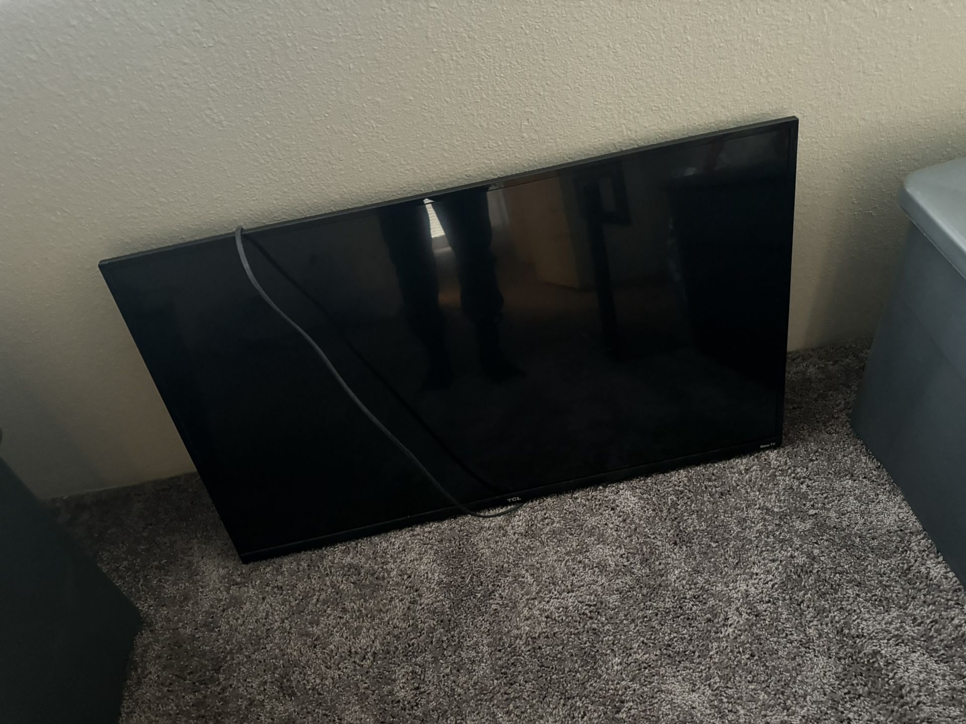 40 inch TCL ROKU TV W/ TV STAND