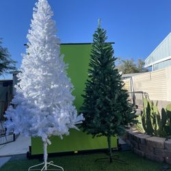 Christmas Trees The White One Is 8 Ft I Am Asking $75 And The green Tree Is 7 Feet I Am Asking $55