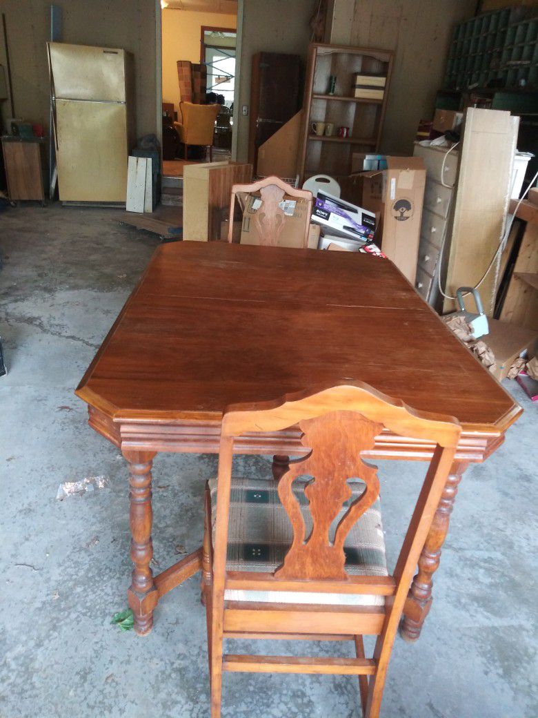 Wood Table And Captain Chair And Two Extras