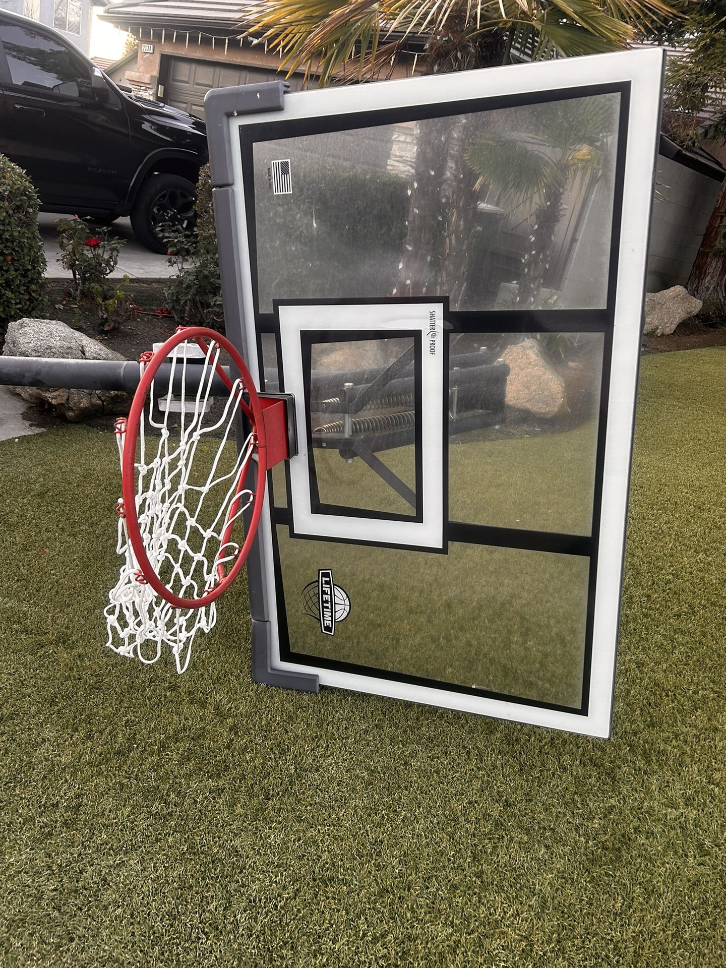 Lifetime 90734 Adjustable Portable Basketball Hoop 54” Tempered Glass Backboard