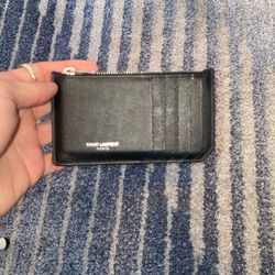 Saint Laurent: FRAGMENTS ZIPPED CARD CASE IN GRAIN DE POUDRE EMBOSSED LEATHER  