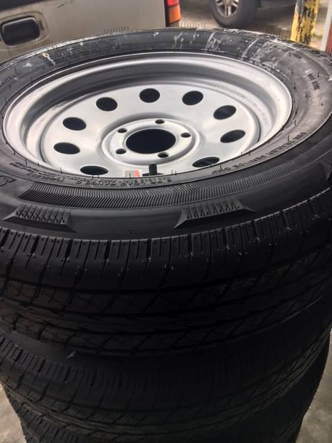 set of 4 - Trailer tires 205/75/15 - 15" 5 Lug Trailer tires - Radial on silver mod - Tire and Rim - free installation - we carry all trailer tires