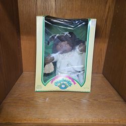 1985 Cabbage Patch Kids doll, specifically an African American version, still in its original packaging