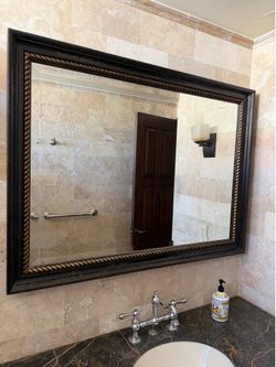 Wood and gold antique mirror