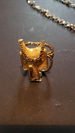 Gold plated saddle tie pin