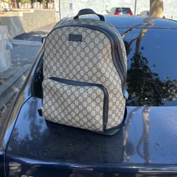 Black GG coated-canvas backpack, Gucci