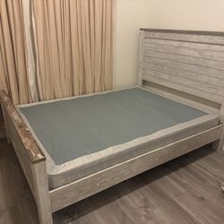 Queen bed frame of a spring box $220 obo