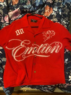 Mixed emotion red button up