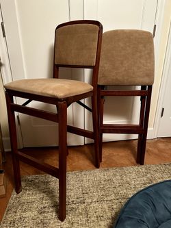 Two Suede And Wood Folding Bar Stools