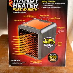 BRAND NEW HANDY HEATER SEALED IN BOX 
