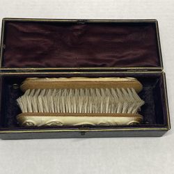 vintage early 20th century brush with a box pre owned