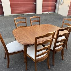 Wooden table and six chairs