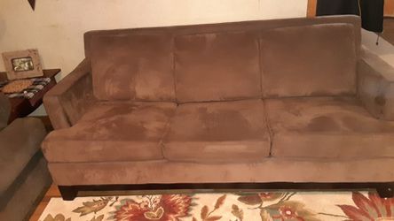 Microfiber couch with pull out bed in good Condition