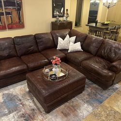 Genuine leather sofa with ottoman. Kathy Ireland collection