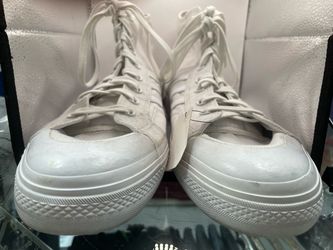 Size: 14 These white canvas high-top sneakers