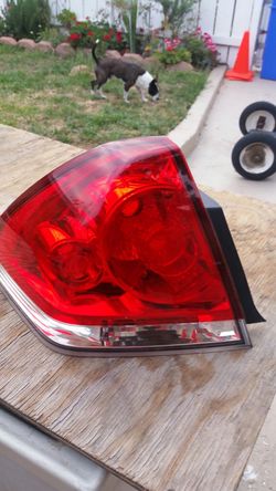 2011 chevy impala driver left side tail light