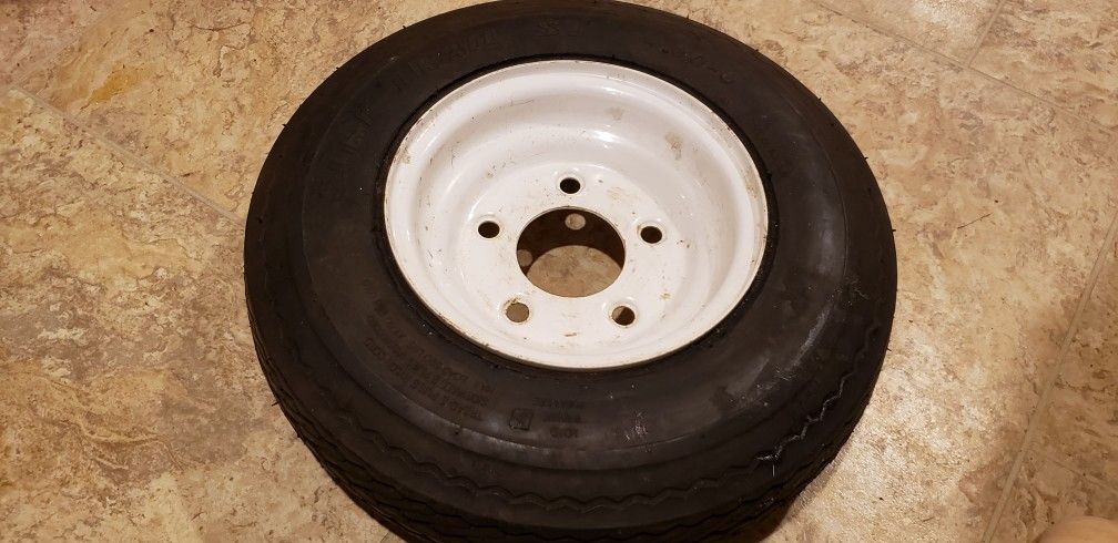 Sure Trail ST 4.80-8 In. 5 lug Rim and tire
Combination