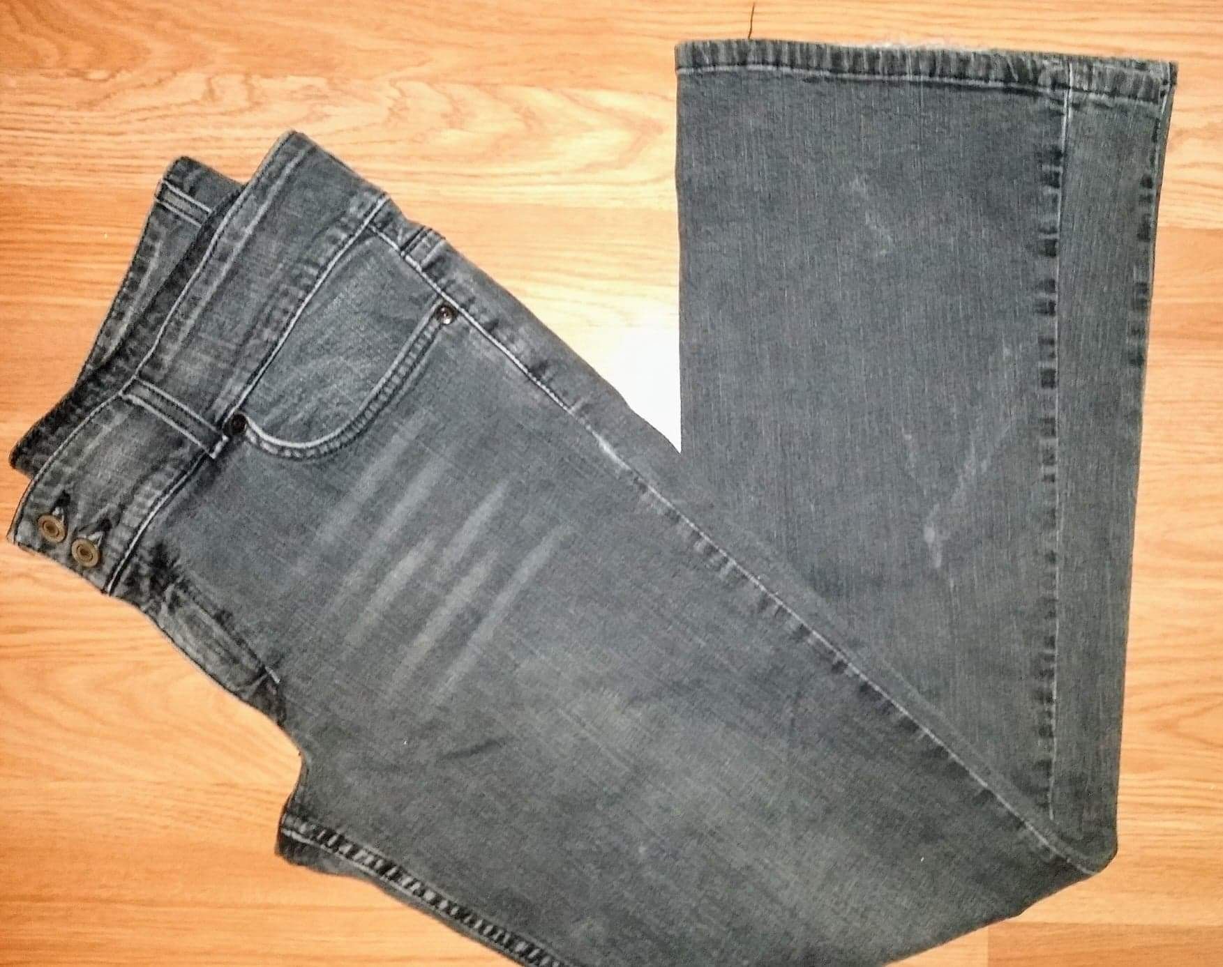 Faded black distressed boot cut jeans size 12R