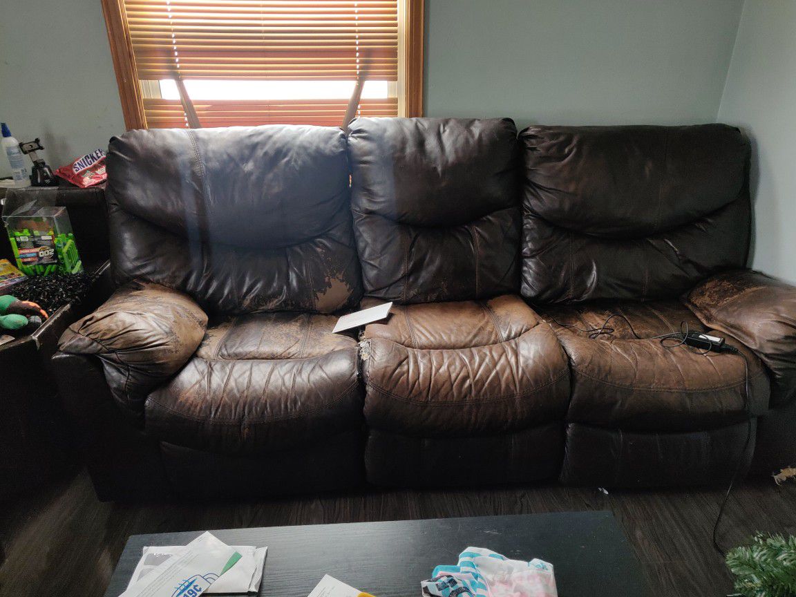 Reclining Couch With Table That Has Power 