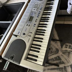 Used Casio LK 45 Keyboard With X Stand And Microphone