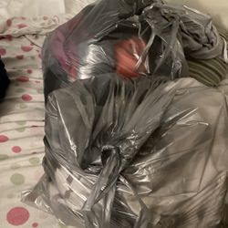 4 Trash Bags Of Women’s Clothes