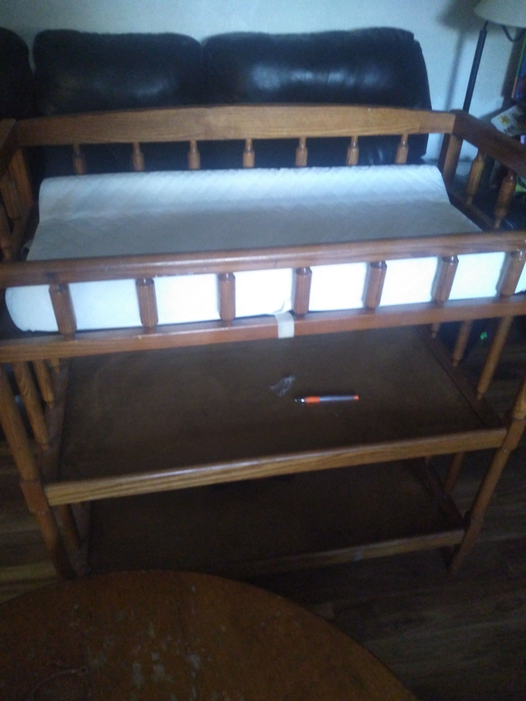 Changing table with lay down pad