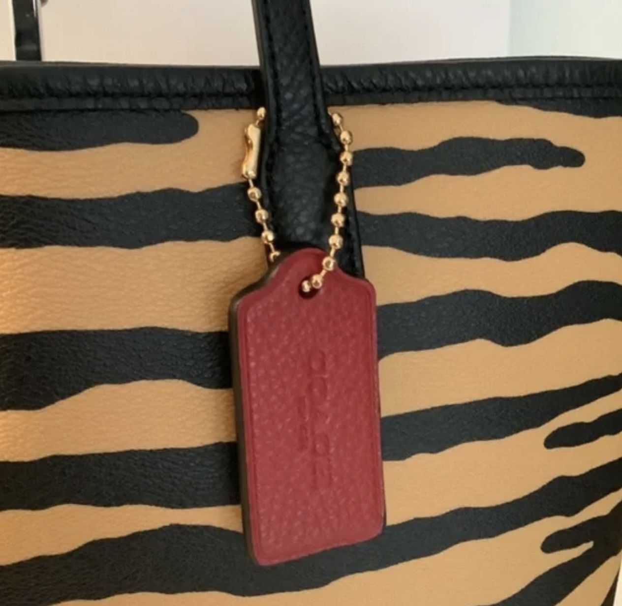 Coach Gold And Black Stripe Print City Tote