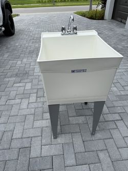 service sink, 19.5 x 19.9 x 12.5 deep