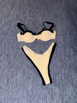 Beige and black 2 piece bathing suit