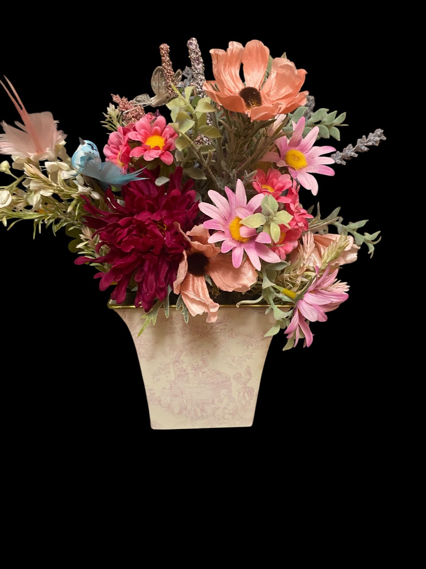 Faux spring variety of flowers and one bird arrangement. Gorgeous flowers!