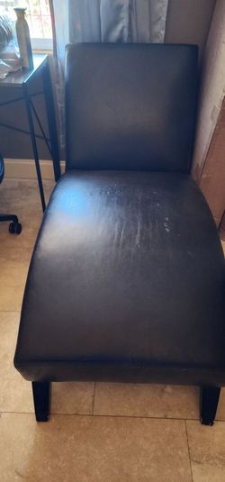 Brown leather-like chase chair