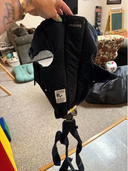 Two different baby carriers